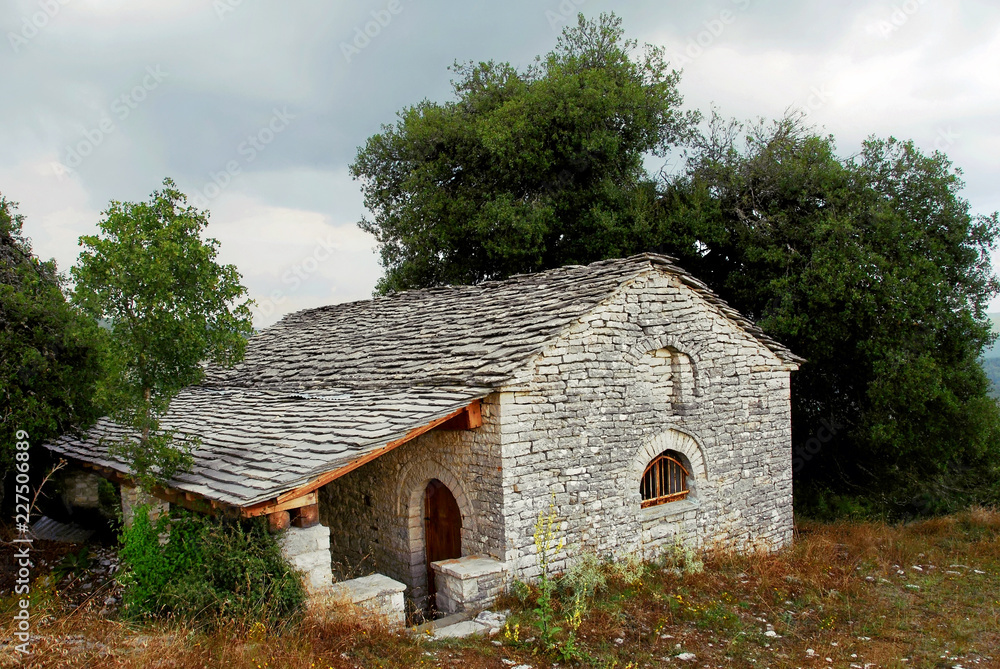 Traditional stone-made country church at Vitsa village, Zagoria area, Ipeiros region, Greece. Traditional stone-made country church at Vitsa village, Zagoria area, Ipeiros region, Greece.