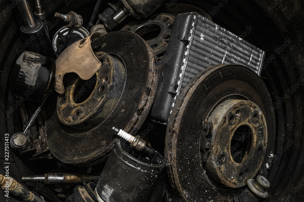 Pile of used automotive parts. Heap of old cars details, auto-waste. Pile of used automotive parts. Heap of old cars details, auto-waste.