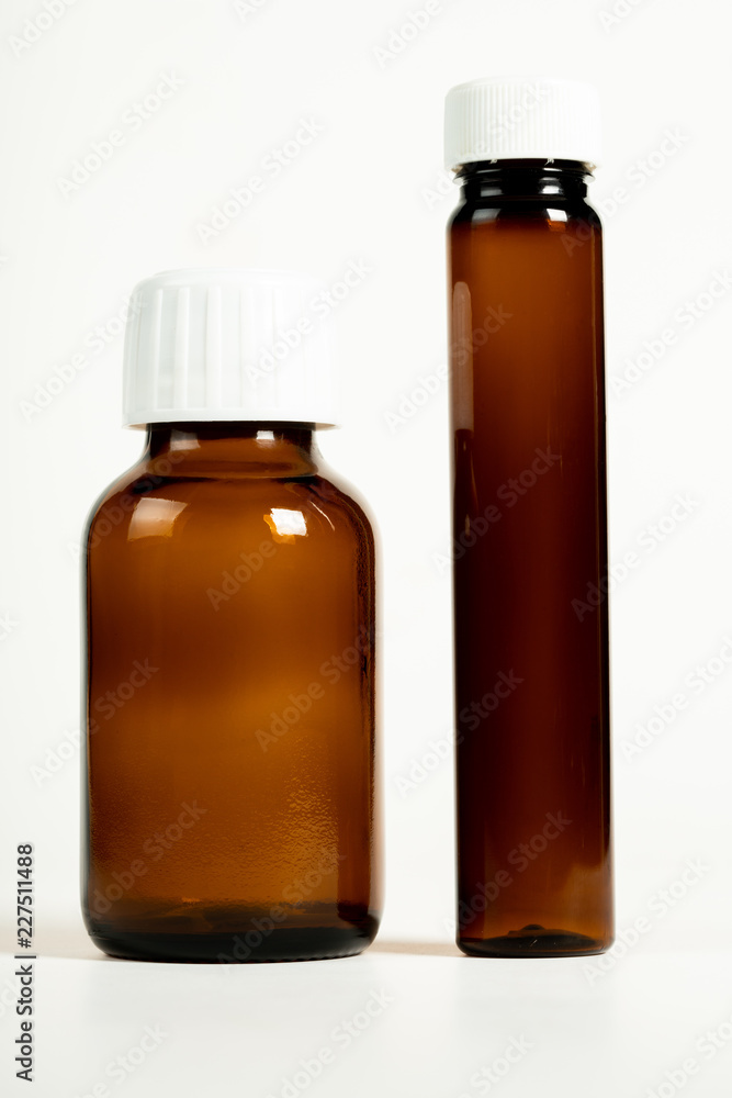 unlabelled empty medicine bottle
unlabelled empty medicine bottle