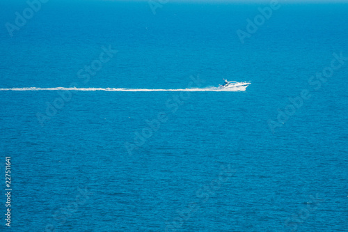 small sailboat floating in the sea   © banusevim