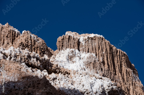 Sand dunes with salt deposits in the Atacama Desert  Chile on a sunny day with blue sky