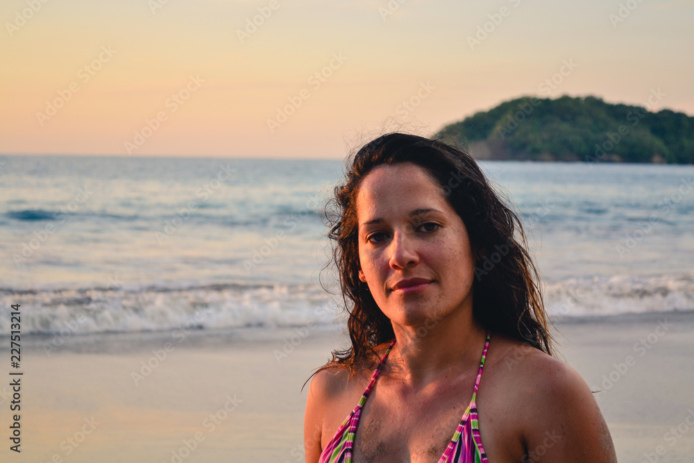 pretty woman on the beach at sunset pretty woman on the beach at sunset
