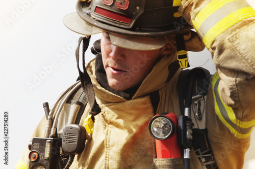 Close-up of firefighter wearing helmet