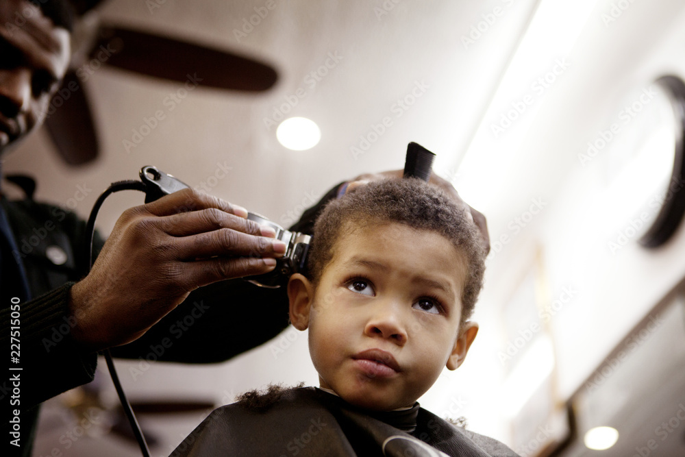 Boy getting haircut Stock Photo Adobe Stock