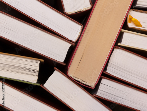 background of stack of books top view of edge pages