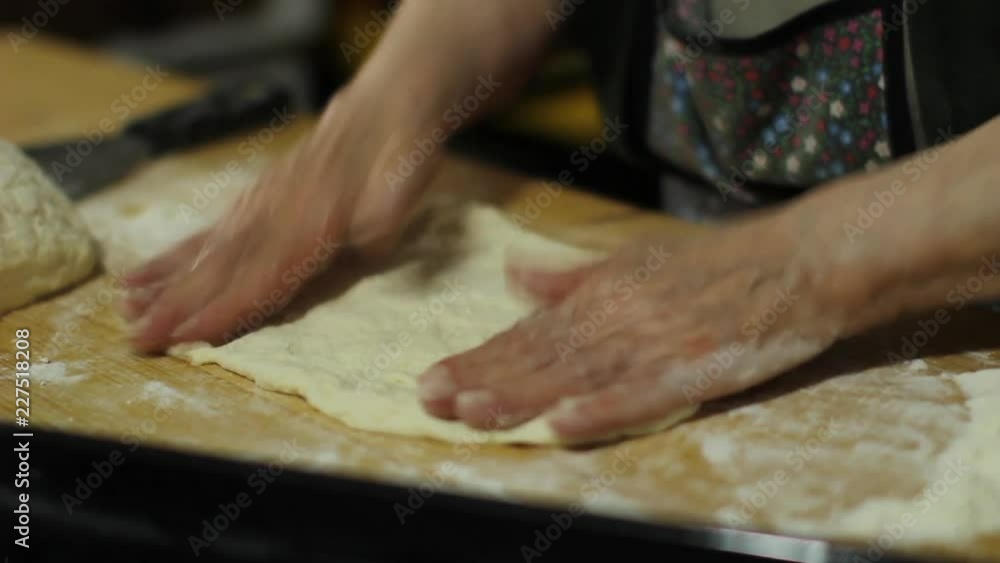 grandmother prepares classical italian pizza grandmother prepares classical italian pizza