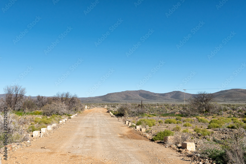 Fototapeta premium Low level bridge and cattle grid on road R356 to Ceres