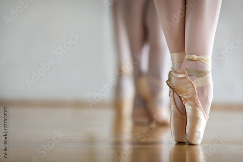 Low section of woman practicing in ballet studio