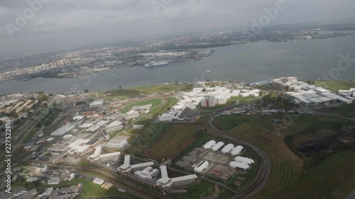 An aerial view of Rikers Island Detention Facility from a plane taking off at LaGuardia Airport.  	 photo