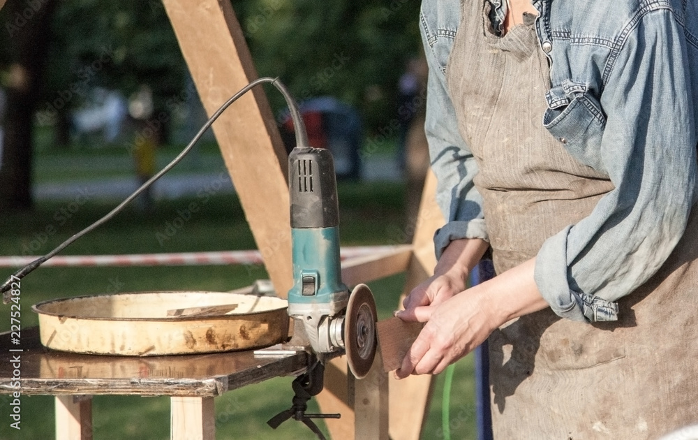 man cutting wood with circular saw man cutting wood with circular saw