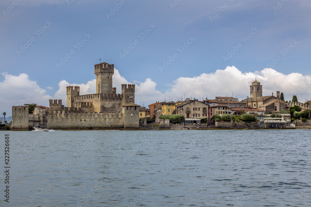 Castle Scaliger (Rocca Scaligera, 13th century) in Sirmione, seen from Lake Garda, northern Italy.