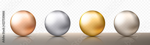 Four realistic transparent spheres or balls in different shades of metallic gold and silver color. Vector illustration eps10 photo