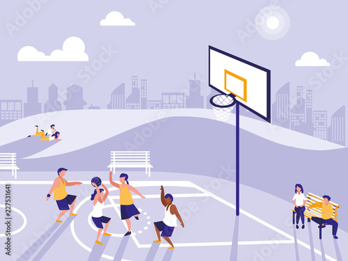 people practicing sport in basketball field