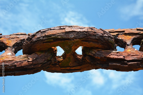 Very old rusty bridge chain links at South Stack on Anglesey