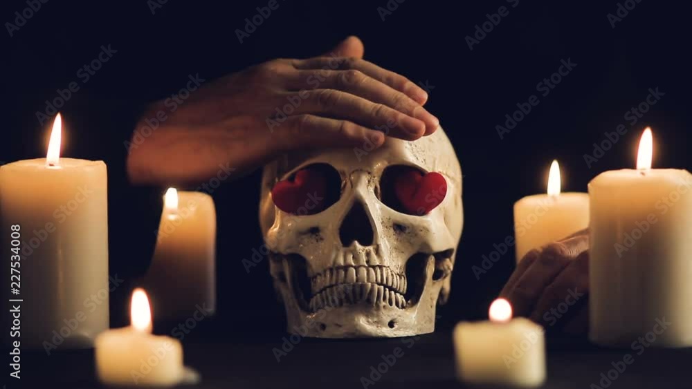 a magical ceremony with a skull and candles a magical ceremony with a skull and candles