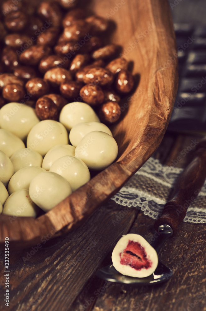 Fototapeta premium fruits and nuts in chocolate
