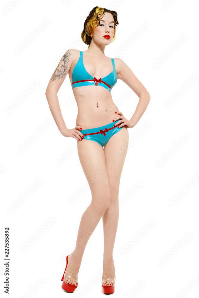 Pin-up girl in latex bikini Stock Photo | Adobe Stock