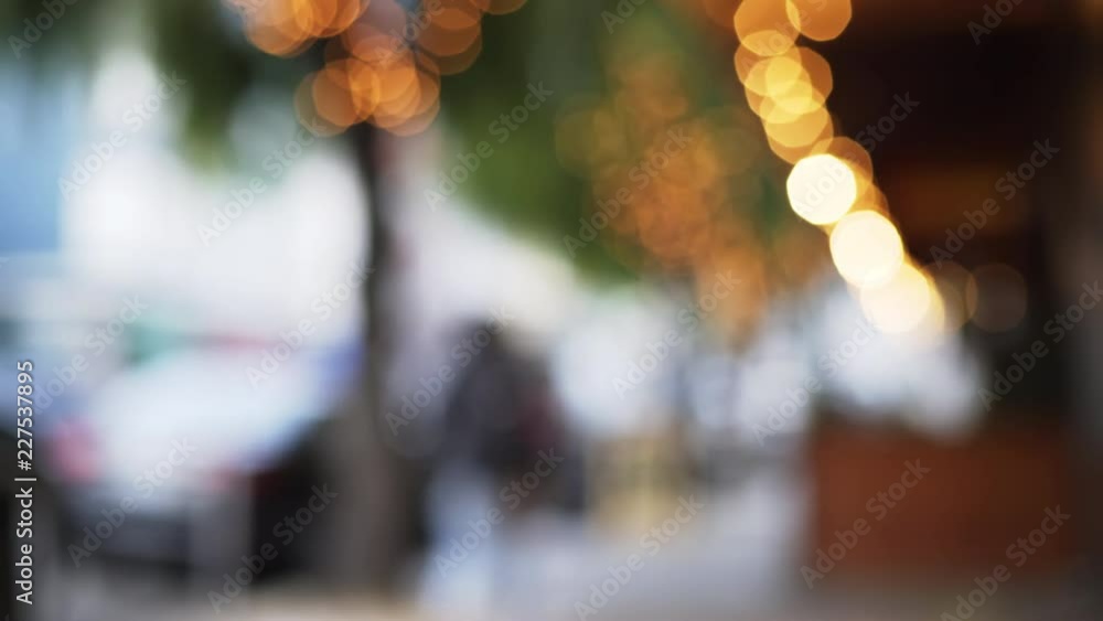 Pretty bokeh lights on an urban street in daytime Pretty bokeh lights on an urban street in daytime