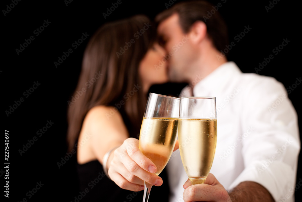 Kissing Couple Toasting the New Year Kissing Couple Toasting the New Year