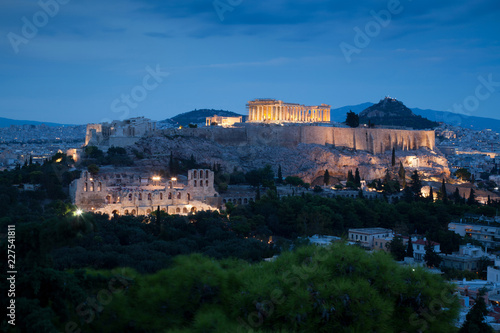 Fototapeta Naklejka Na Ścianę i Meble -  athens seen from Philopapou hill with views to Herodium , Acropolis and the Parthenon at blue hour, Attica, Greece