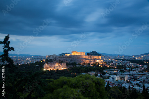 athens seen from Philopapou hill with views to Herodium , Acropolis and the Parthenon at blue hour, Attica, Greece