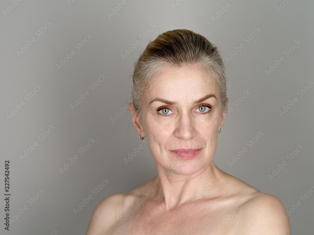 Beautiful confident model on gray background Beautiful confident model on gray background