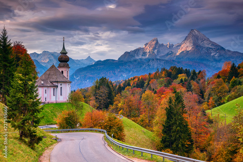 Autumn in Alps. Image of the Bavarian Alps with Maria Gern Church and Watzmann mountain during beautiful autumn sunrise. photo