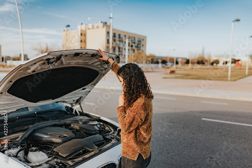 A woman with car problems photo