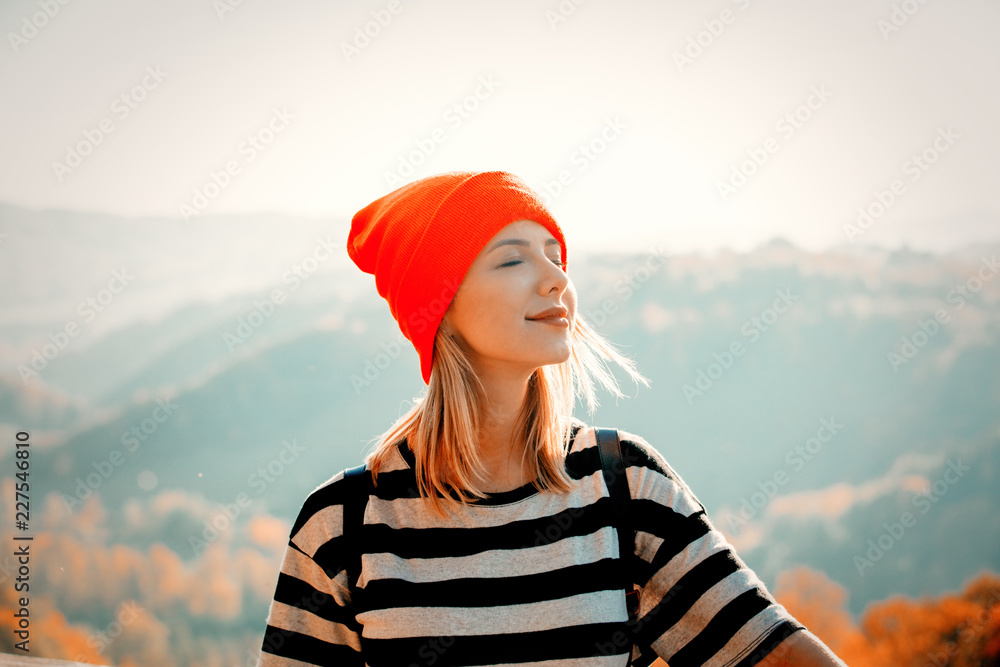 © Masson - Style girl and forest with mountains on background. Autumn season time scene © Masson - Style girl and forest with mountains on background. Autumn season time scene