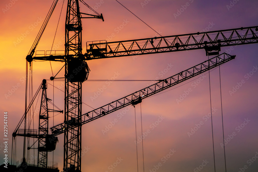 construction crane at sunset close-up