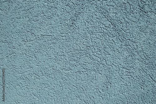blue textured concrete wall closeup