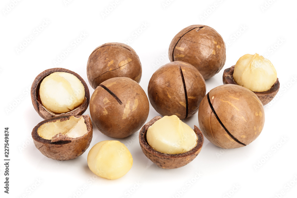 Shelled and unshelled macadamia nuts isolated on white background Shelled and unshelled macadamia nuts isolated on white background