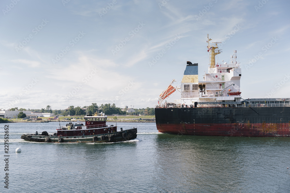 Tugboat Guiding Ship Through Harbor Tugboat Guiding Ship Through Harbor