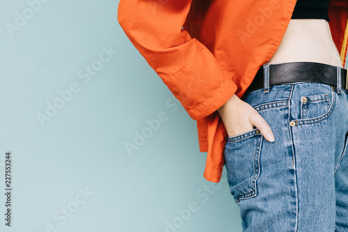 Hand in the back pocket of jeans photo