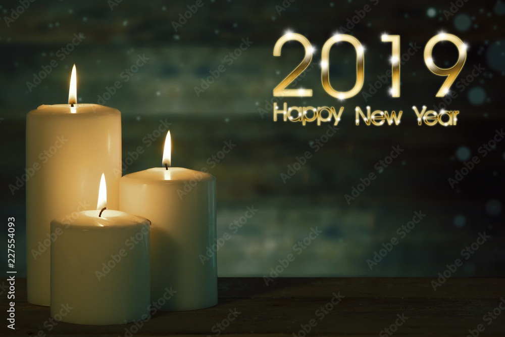 Christmas candle with 2019 Happy New Year text Christmas candle with 2019 Happy New Year text
