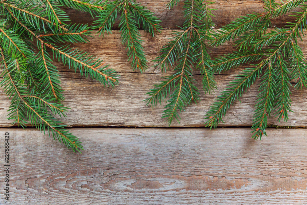 Christmas New Year composition frame winter objects with fir branch on old shabby rustic wooden background. Xmas holiday december decoration. Time for celebration concept. Flat lay top view copy space Christmas New Year composition frame winter objects with fir branch on old shabby rustic wooden background. Xmas holiday december decoration. Time for celebration concept. Flat lay top view copy space
