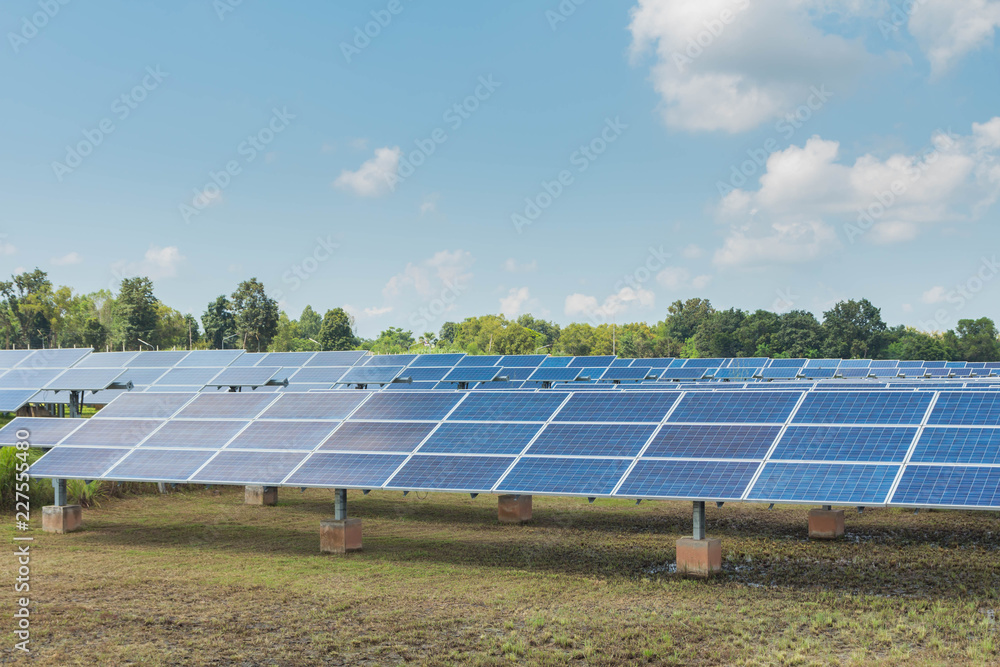 Solar energy with blue sky, It's clean and energy for free use. This is a system that adjusts to the sun Solar energy with blue sky, It's clean and energy for free use. This is a system that adjusts to the sun