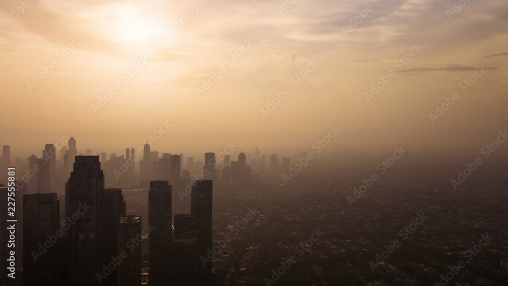 Downtown Jakarta with silhouette of skyscrapers