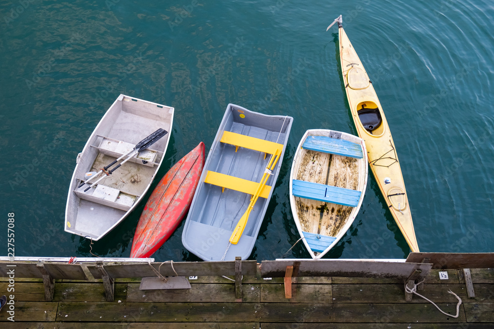 small boats at dock on the ocean small boats at dock on the ocean