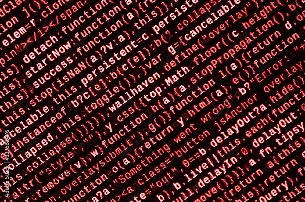 Writing programming code on laptop. Digital binary data on computer ...