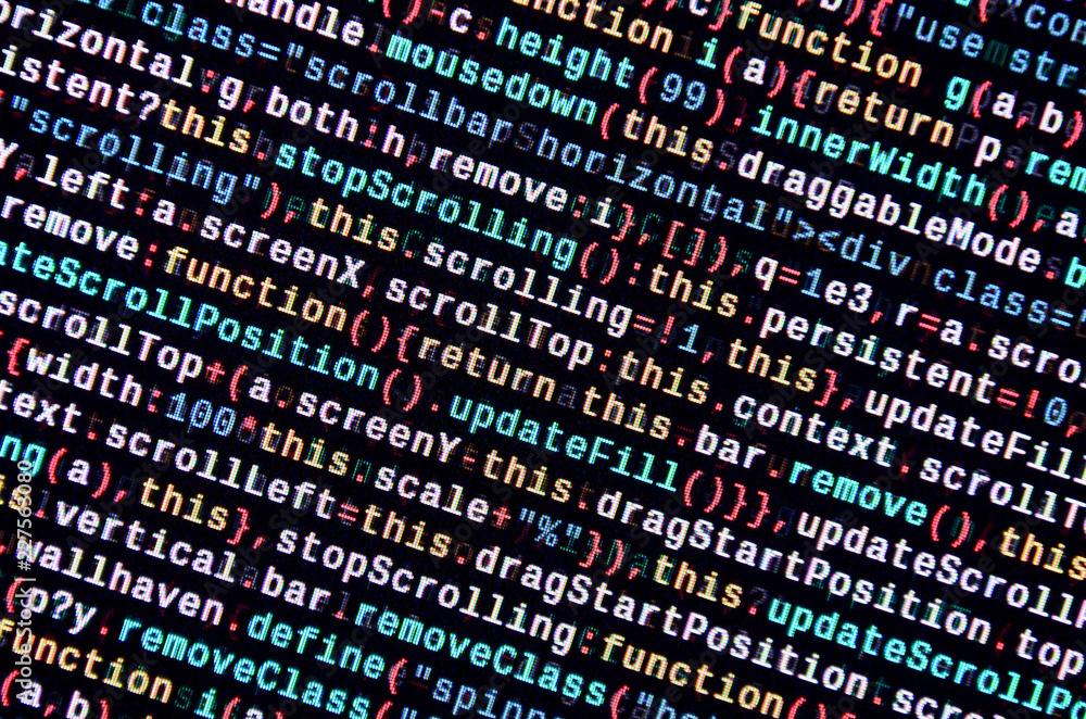 Writing programming code on laptop. Digital binary data on computer ...