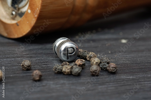 Black pepper with the grinder knob labelled as P