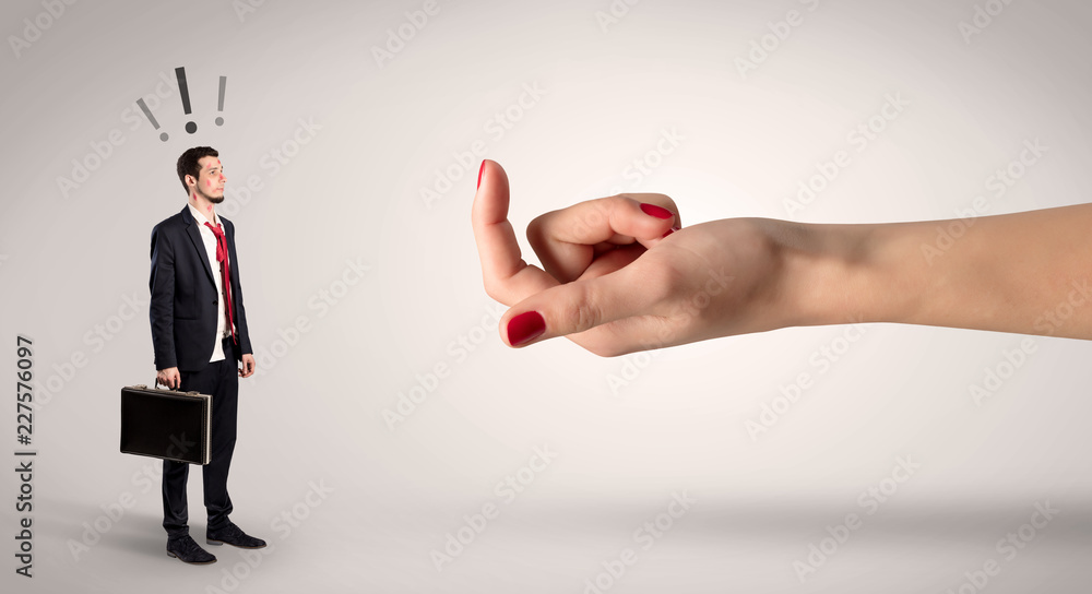 Businessman in an affair with kisses on his face and question concept
Businessman in an affair with kisses on his face and question concept