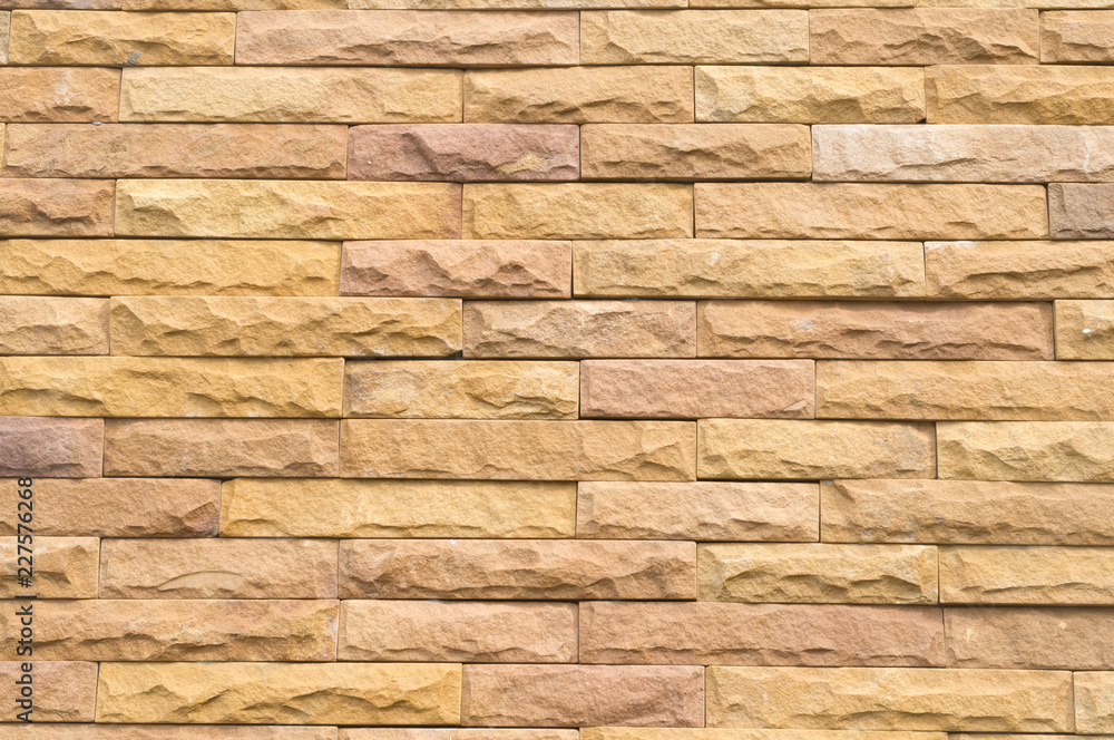 Beautiful yellow stone wall background