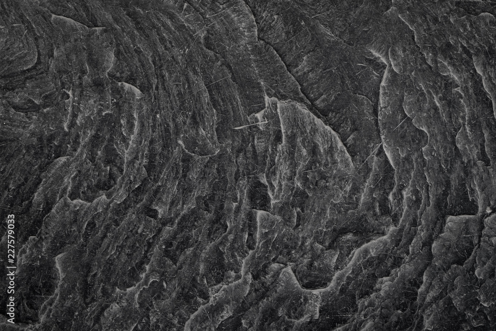 Naklejka premium Black granite stone rough texture background