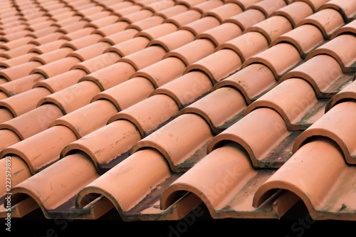 Cluse up of old roof tiles orange color