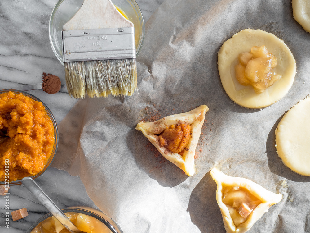 Traditional Jewish pastry, hamantaschen, served during Purim with a