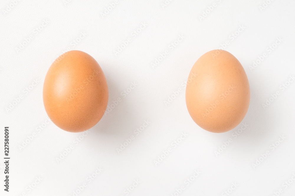 Couple brown chicken egg on white background Couple brown chicken egg on white background