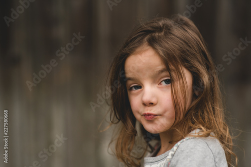A child making faces and giving attitude photo