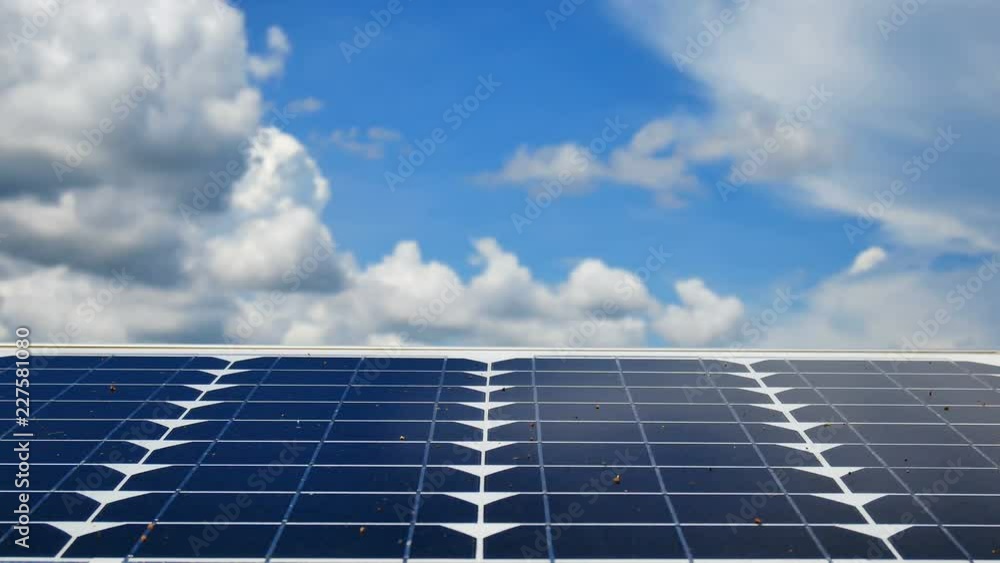 Technology Video Solar panels are used to produce clean electricity environmentally friendly with the sky background. In green technology and renewable energy ideas. Technology Video Solar panels are used to produce clean electricity environmentally friendly with the sky background. In green technology and renewable energy ideas.